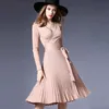 Vestido de punto con cuello en V sexy de otoño de estilo europeo falda plisada con fajas 7 colores más el tamaño