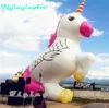 Unicornio inflable noble de 5 m, unicornios blancos puros al aire libre mostrados para el parque