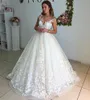 Abiti da sposa in pizzo bianco / avorio Abiti da sposa con applicazioni senza maniche Scollo trasparente Lunghezza fino al pavimento