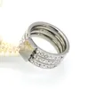 Femme marque or couleur Zircon cristal titane acier inoxydable anneaux pour femmes hommes bijoux de mariage trois couches beauté anillos