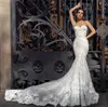 Abiti da sposa a sirena vintage Scollo a spaghetti Abiti da sposa Appliques Pizzo Sweep Lunghezza Backless Robe de mari￩e