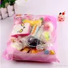 Hot10pcs / lot Squsies Toy lent lent Rising Squishy Rainbow Sweetmeats Gilce Cream Cake Breadberry Bread Charm Téléphone