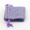 50pcs Tecido de linho roxo Praques de jóias de jóias de jóias de jóias Bolsas de juta de estopa 10x14cm etc.