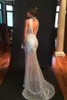 Sexy Nude Mermaid Prom Dresses 2018 High Neck Crystal Beaded Tulle See Through Backless Evening Gowns Sparkle Bling Party Dress