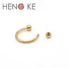 Horseshoes en or rose anneau des boucles de lèvres Labret avec boule de nez circulaire de pouce de nez septum 316l Boucles d'oreilles en acier inoxydable9970625