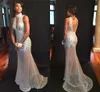 Sexy Naakt Mermaid Prom Dresses 2018 Hoge Hals Crystal Beaded Tulle See door backless avondjurken Sparkle Bling Party Jurk