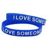 100 pièces j'aime quelqu'un avec l'autisme Bracelet en caoutchouc de Silicone rempli d'encre Logo bleu pour la Promotion Gift293V