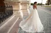 Splendidi abiti da sposa trasparenti castello 2022 Ball Illusion Back Appliques Abito da sposa con strascico in cappella in stile occidentale