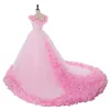 Robes de mariée roses romantiques robes de bal princesse appliques 3D-florales grandes robes de mariée modestes gonflées à manches courtes arabe Dubaï robe262H