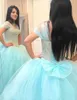 Elegante Cap Sleeve bola vestido azul Prom Vestidos Top frisada Puffy Tulle Vestidos Partido Evening Wear 2018 Winter Garden quinceanera vestidos Bow