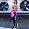 Wholesale Gym Fitness Bodysuit Женщины бегущие узкие комбинезоны спортивные йоги устанавливают повязку без спинки перекрестные размыты женские трексуиты