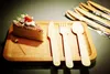 2020 Promotional 100% biodegradable Wooden Party Cutlery Black Wood Spoon Fork Knife Disposable Tableware High Quality Cheapest 200pcs / set