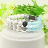 Womens 쥬얼리 도매 10pcs / lot 8mm 자연 푸른 마노 흰색 Howlite 대리석 돌 4 색 명확한 CZ 비즈 Macrame Bracelets