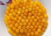 Polychromatic jade beads, about 10 mm in diameter (a pack of 40)