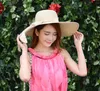 女性夏のファッション折りたたみ式ちょう結び白い太陽の帽子広い大きいブリムトラベルビーチキャップサン保護帽8色