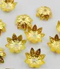 1000 tappi di perline di fiori placcati in oro per gioielli che fanno risultati artigianali 10 x 4 mm