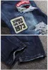 Wholesale-Personality Badge Patchwork Jeans Men Ripped Jeans Classic Rap Scratched Biker Jeans Hole Denim Straight Slim Fit Casual Pants