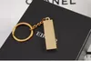 The gold brick shaped key chain Pure gold 9999 purity key ring Simulation of gold creative small gift