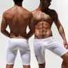 Medias de entrenamiento de los hombres al por mayor-sexy Pantalones cortos de moda casuales elásticos Troncos de cintura baja Malla Longitud de la rodilla flaca 13M0016
