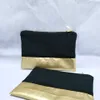 black canvas cosmetic bag with waterproof gold leather bottom matching color lining and gold zip 7x10in makeup bag ship by DH280V