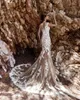 2016 Robes de mariée modestes avec jupe détachable Sexy Sheer Lace Applique Jewel Neck Champagne Une ligne Illusion Camo Robes de mariée Long Train