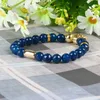 Fashion Jewelry Wholesale 8mm Faceted Blue and Black Agate Stone Micro Pave Double Skull Beaded Bracelets for men