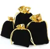 Fluwelen pouches fit geschenk tassen goud kleur trekkoord zakjes voor sieraden opslag hoge kwaliteit pouches 7x9cm