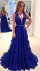 Jurken elegante vneck mouwloze avondjurk Royal Blue Lace Appliques Sexy hoogwaardige prom -jurk Vestidos de Baile de Formatura