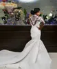 Afrikanska glamorösa sjöjungfru bröllopsklänningar 2019 Lyxiga pärlor Crystal High Neck Långärmade Applique Bridal Gowns Vestido de Noiva