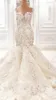 Robes de mariée en cristal de luxe Robes de Dubaï Sirène Trompette Fit et Flare Appliques de dentelle perlée Floral Agrémenté Perles Robes de mariée