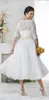 Vintage 2019 Spitzenapplikationen Plus Size Bohemian Brautkleider mit transparenten Halbärmeln 1950er Jahre V-Ausschnitt Teelänge A-Linie Strand 241f