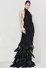 Luksusowy Cristinasavulescu Side Split Feather Black Koktajl Suknie Bez Rękawów Halter Backless Linia Sexy Sweep Train Prom Suknia