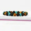 Nya Designs Beaded Armband Partihandel 10st / Lot 8mm Lava Rock Stone med Naturliga Gula Trä Pärlor Mode Armband