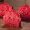 100pcs boîte à bonbons creuse découpée au laser rouge avec ruban faveurs de fête de mariage coffrets cadeaux sacs nouveau