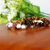 1pcs Matador Armband 8mm Svart Onyx och Tiger Eye Stone Pärlor med Alloy Cow Menwomen Bullfight Charm Armband