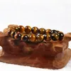 En gros Livraison Gratuite 12 pcs/lot 10mm Naturel Oeil De Tigre Rond Pierre Perles Bracelet Bijoux Vente Chaude Pour Femmes et Hommes Cadeau