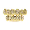 Trendy Party Props Hip Hop Bling Smycken Bio Koppar Guld Tänder Grillz Caps Topp Bottom med CZ Poker Charm Grill Set Tanduttag