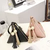 2017 spring new triangular women designer handbags Korean version tassel female makeup fashion chain oblique girls mini cross body bags