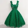 emerald green knee length dresses