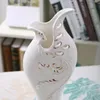 家の装飾のための現代の蝶形陶磁器の花瓶の花瓶白い色