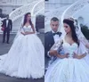 2020 Saudiarabien Bollkakor Bröllopsklänningar Sweetheart Cap Sleeves Lace Appliques Crystal Beaded Plus Size Court Tågformella Bröllopklänningar