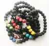 Ny ankomst lava rockpärlor charms armband färgade pärlor mäns kvinnors naturliga stensträngar armband för modesmycken