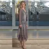 Elegante chiffon kralen moeder van bruid jurken 2019 thee lengte moeders bruiloft jurken met pure lange mouwen jas