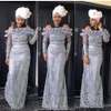 Amazing Silver Off Shoulder Aso Ebi Aftonklänningar Lace Appliques Slida Prom Klänningar med Sheer Långärmad Golvlängd Kvinnor Formellt Slitage