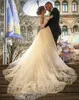 Скромный 2017 кружева аппликация Overskirt свадебные платья со съемным поездом с длинным рукавом тюль свадебные платья на заказ фарфора EN12169