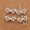Perline di fascino animale con fiocco a farfalla cavo 17.4x9.3mm Distanziatori in argento tibetano Risultati dei gioielli L688 300 pz/lotto