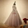 ウェディングスパンコールボールガウンビーズレースアップリケ安い女の子聖体拝領のドレスのためのエレガントな長袖の花の女の子のドレス