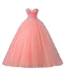 coral pink quinceanera jurken