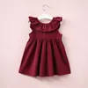 2017 Estate neonate Profondo scollo a V Pieghettato Halter Dress Arco Foglia di loto bambini Vestito da principessa Abbigliamento per bambini C2283