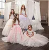 Princesa Appliques Flor Meninas Vestidos Bead Arco Tiered Tule Girls Pageant Dress Custom Communication Wear